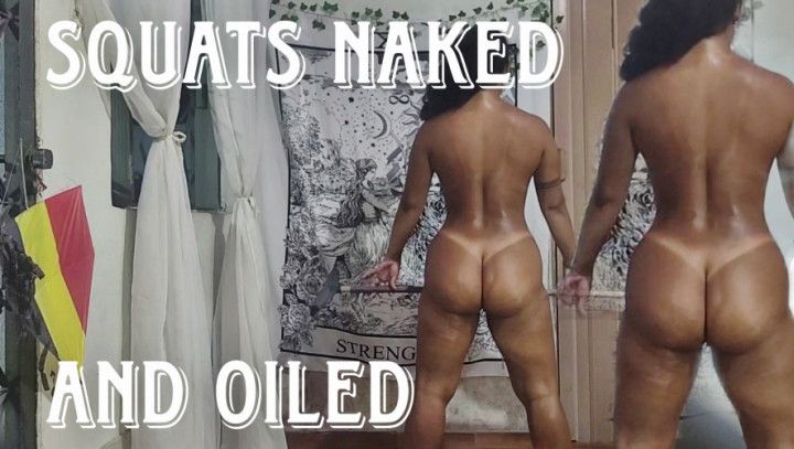 Squats naked and oiled