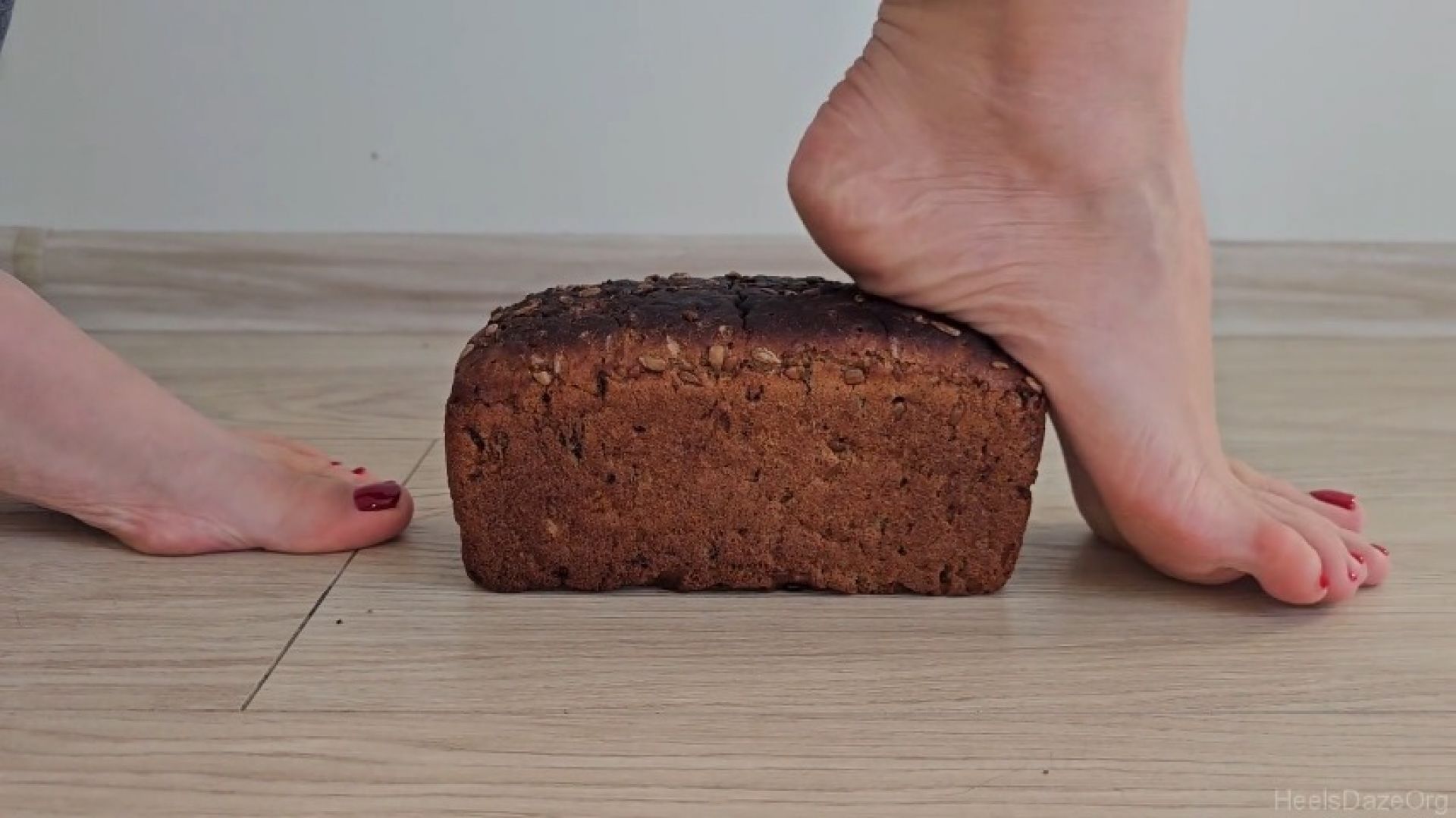 Trampling Loaf of Bread Barefoot