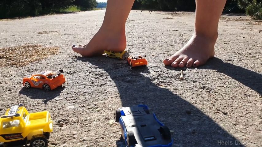 Barefoot Goddess Crushes Toy Cars