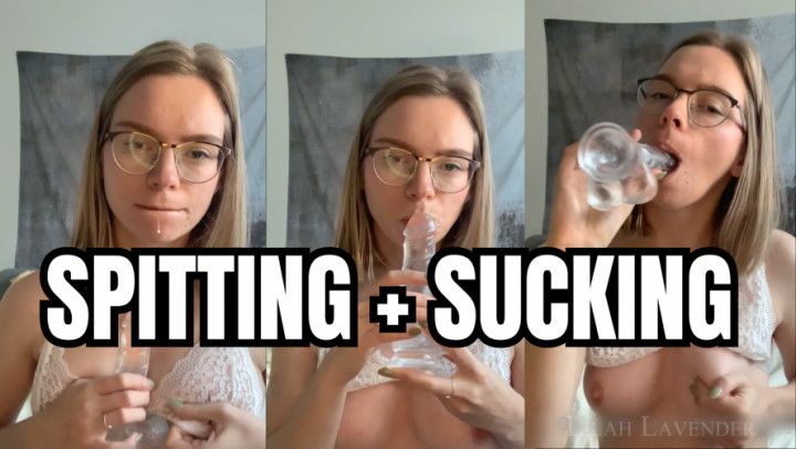 Spit and dildo sucking with tits out