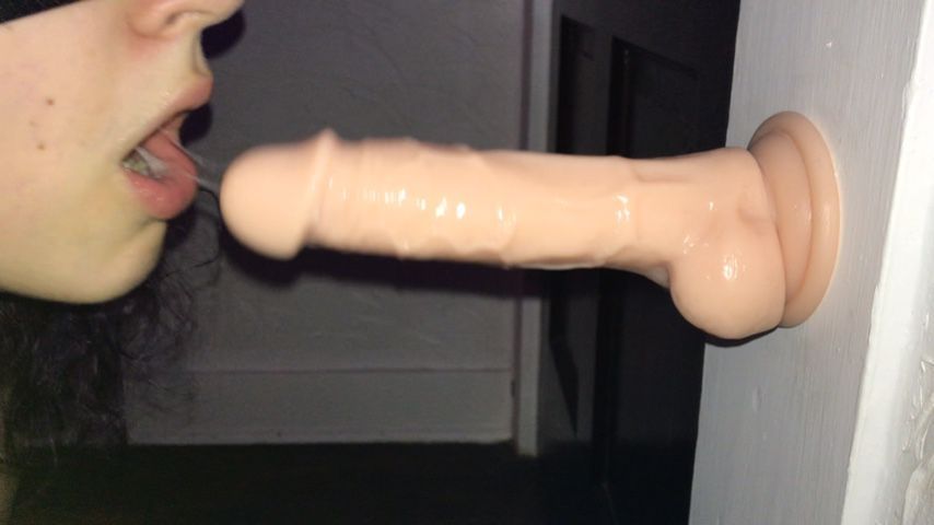 Girl gives her first dildo a blowjob