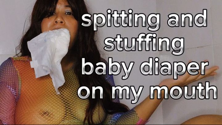 Spitting and stuffing a baby diaper on my mouth