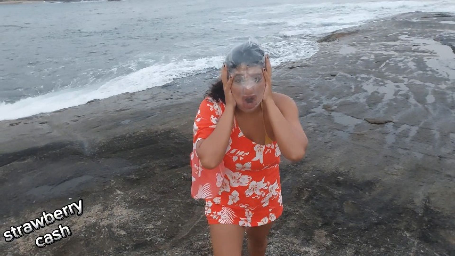 Plastic wrap breath play at the beach