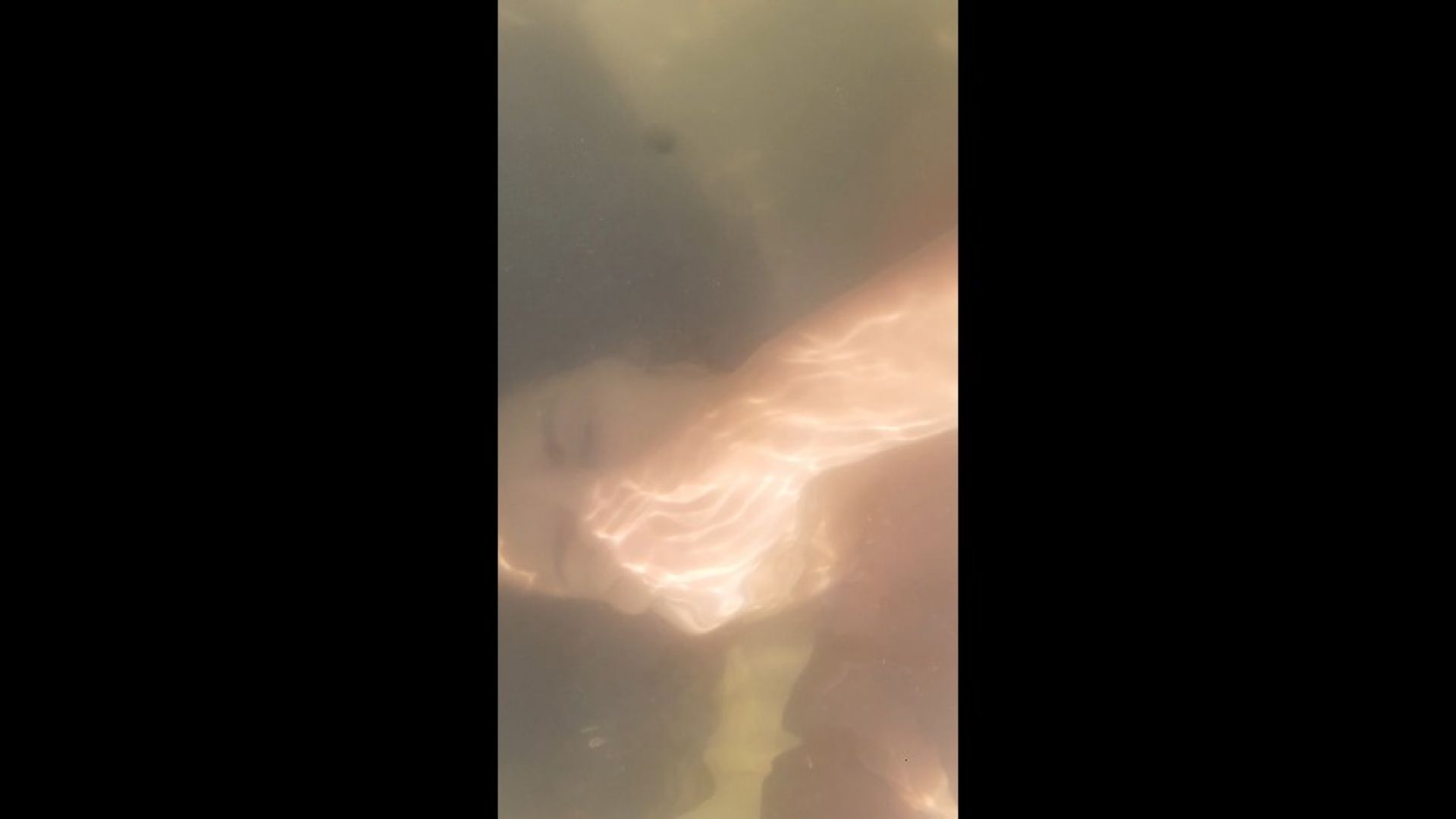 Holding breath Underwater showing boobs on the lagoon