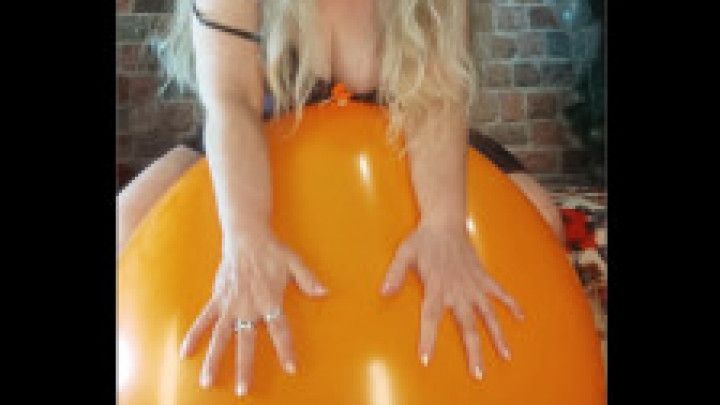 Inflating and playing with orange 36 inch