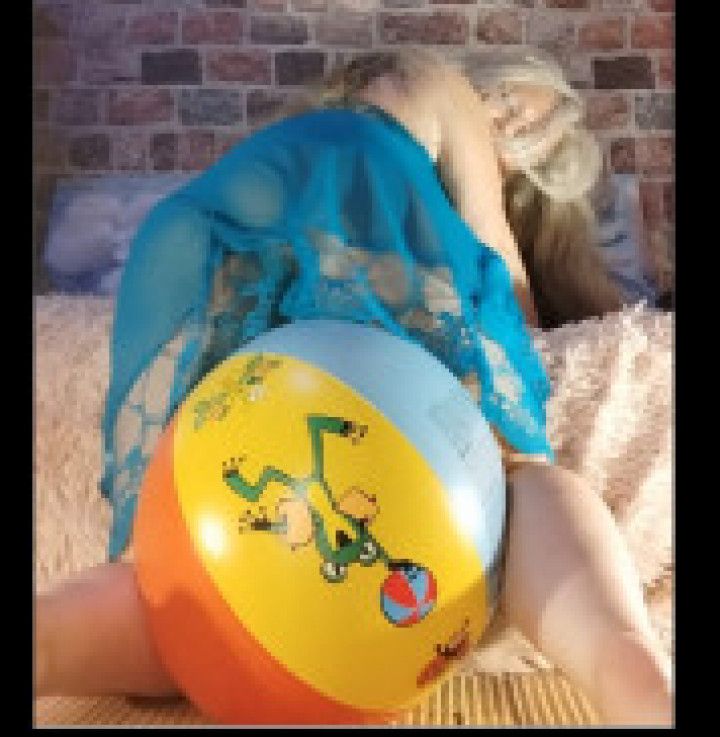 Riding and deflating my new beach ball