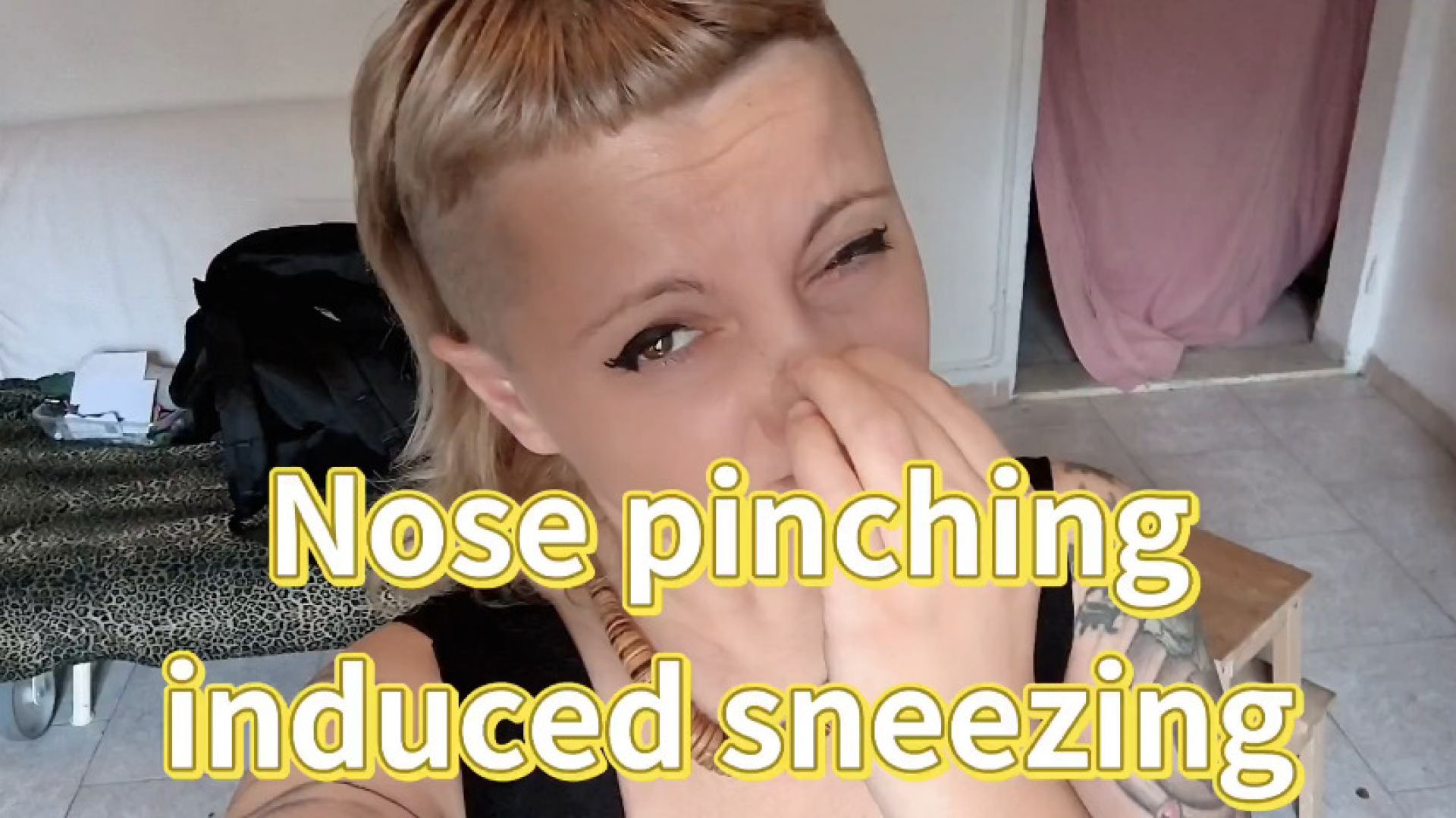 NOSE PINCHING INDUCED SNEEZING