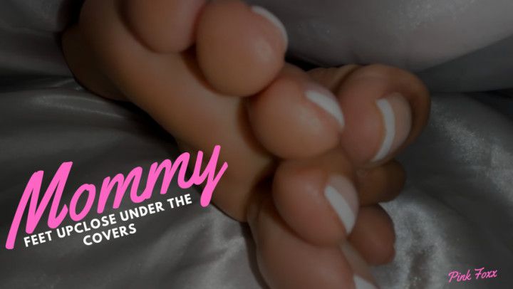 Mommy Feet Up Close Under the Covers