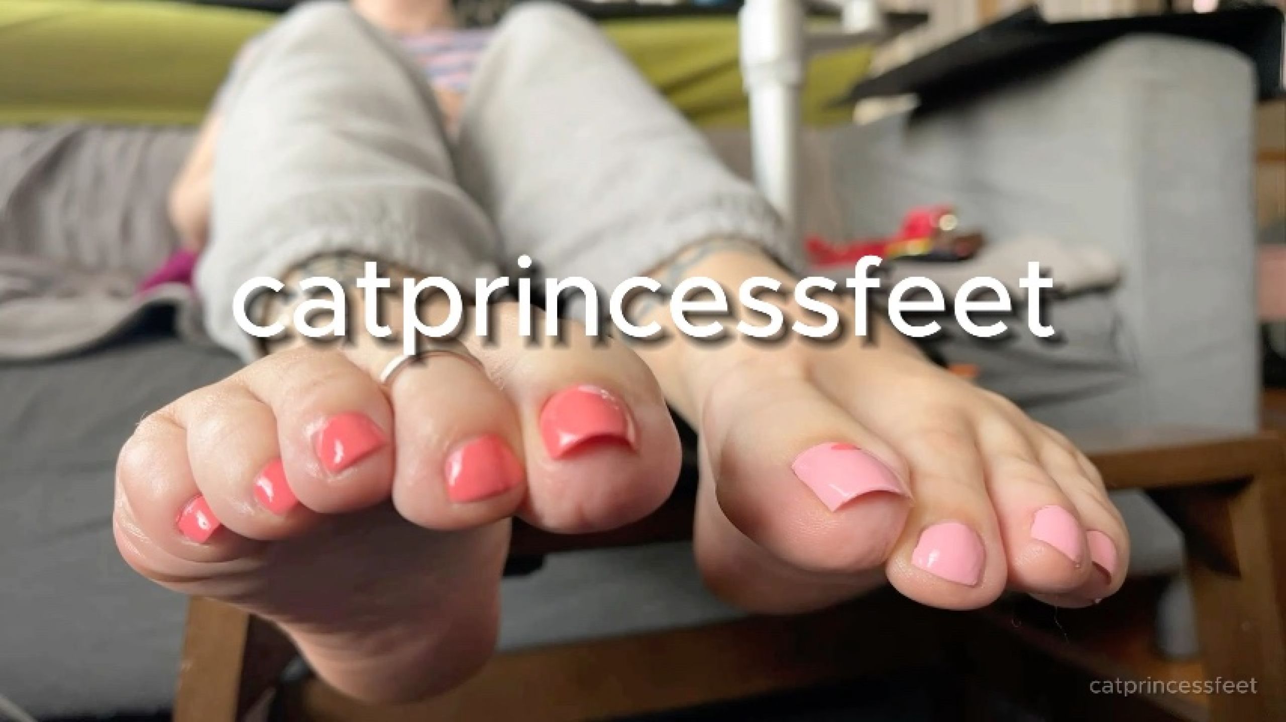 Pink and peach mismatched pedicure, long toes, high arches