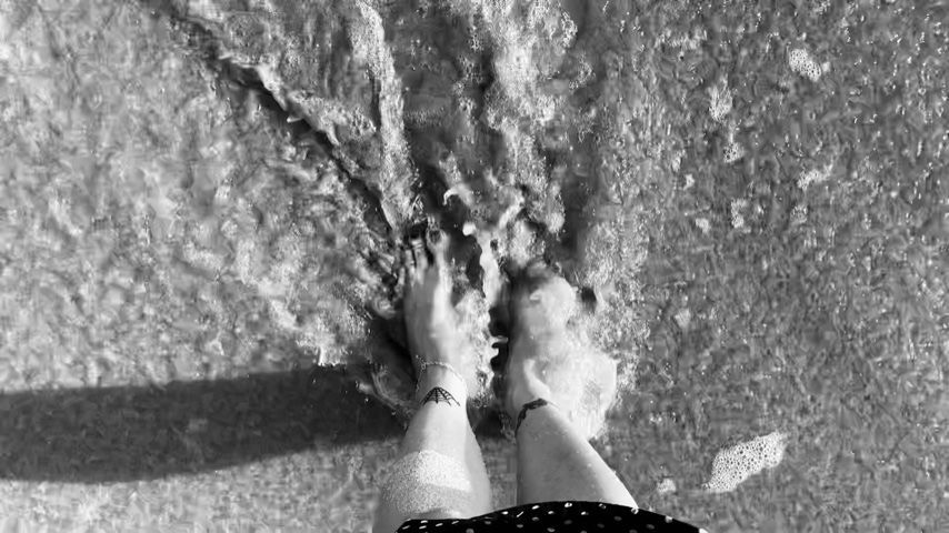 Beach feet, walking in sand and water