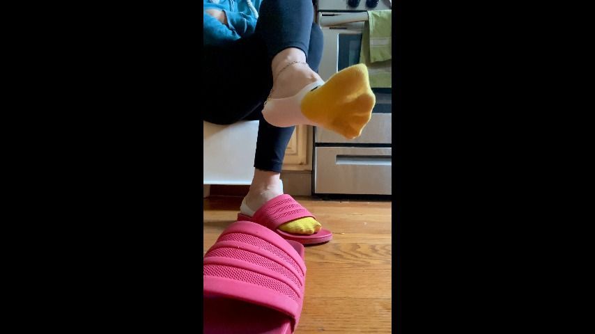 dangle and sock-removal by toes