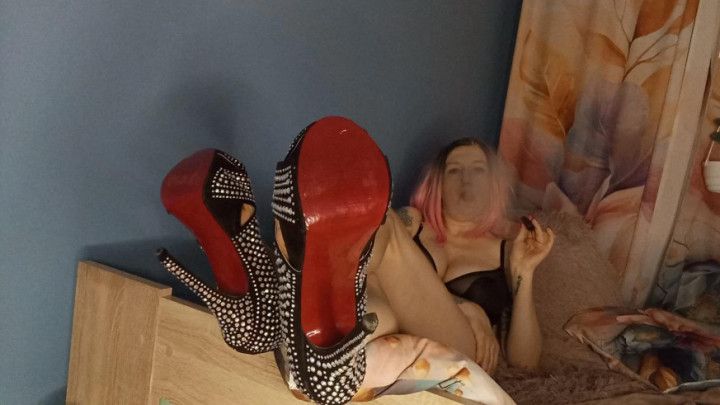 Lady Angela sensual vaping from her bedroom red bottom heels