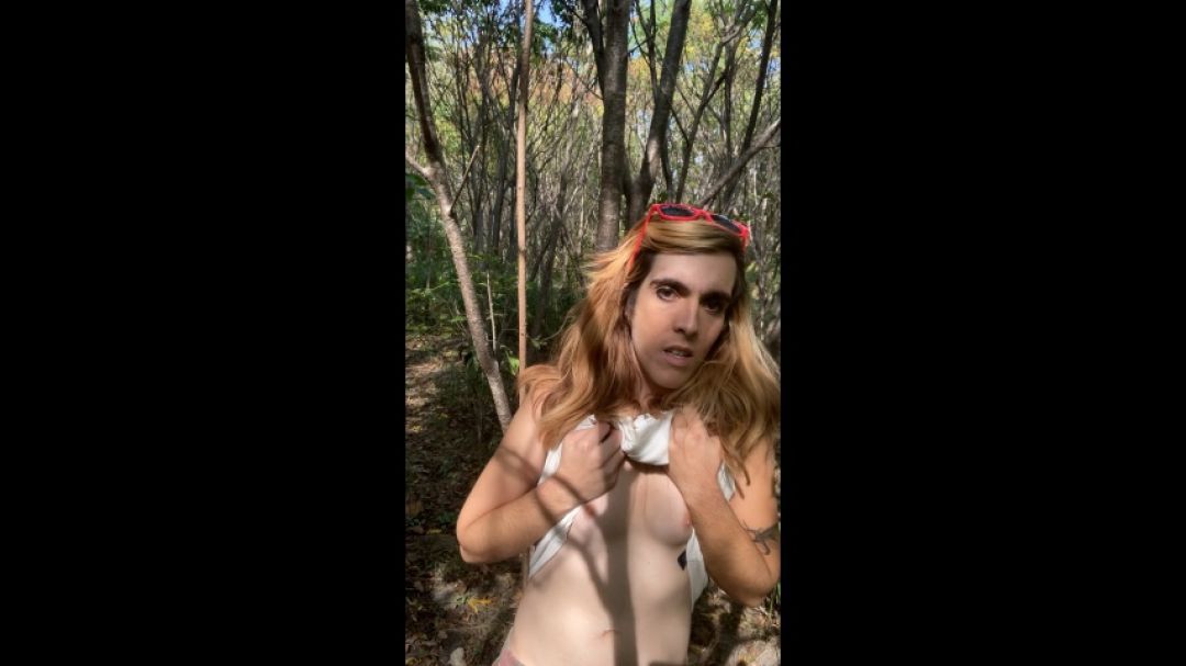 Flashing and playing with my tits in the woods