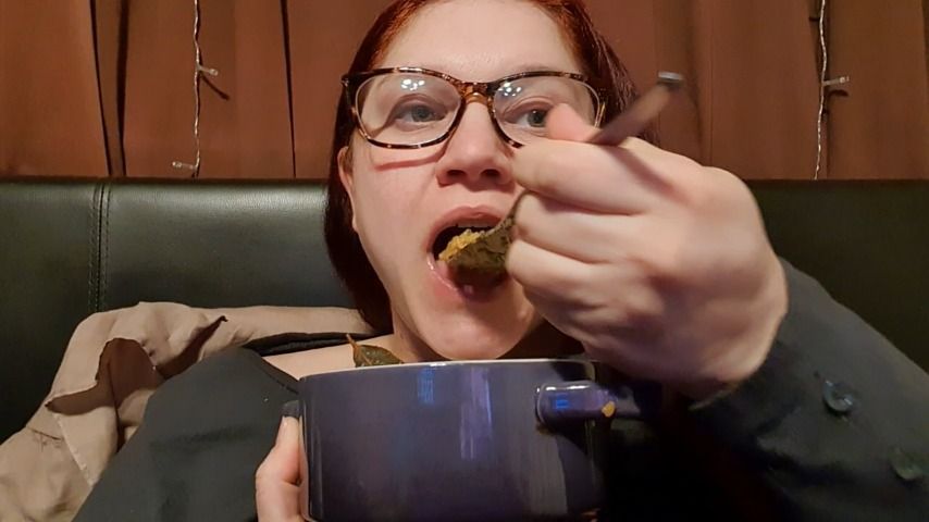 Chubby face eating a bowl of curry