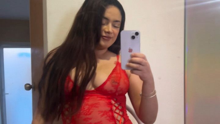 Masturbating in front of the mirror wearing red lingerie