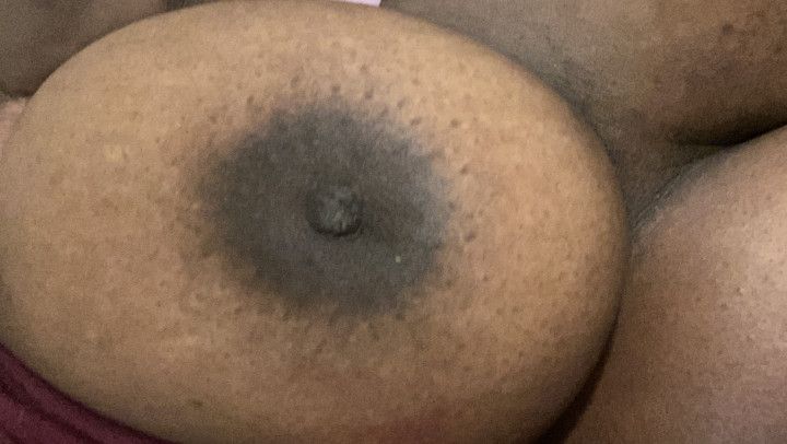 Playing with my titties in bed