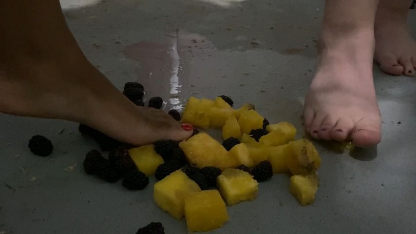 Two Goddesses stomping on fruit barefoot