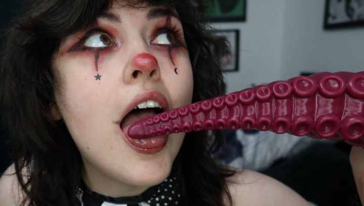 Clown girl sucks off tentacle monster