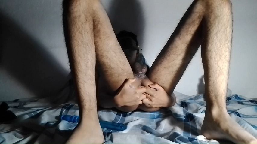 Latino boy uses an anal toy for the firs