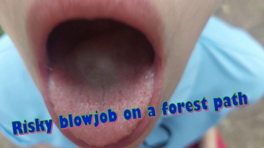 Risky blowjob on a forest path