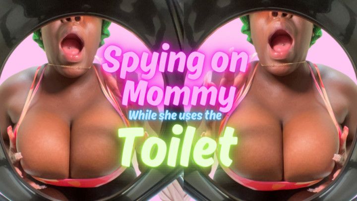 Spying on mommy while she uses the toilet
