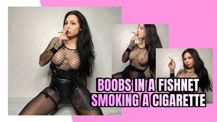 BOOBS IN A FISHNET SMOKING A CIGARETTE