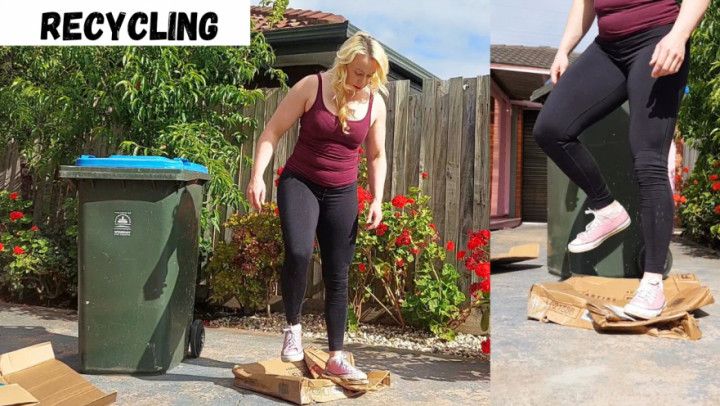 Stomping cardboard boxes flat for recycling trample crush