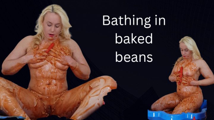 Nude bathing in baked beans and sausages