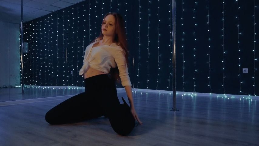 redhead girl sexy poledance high heels