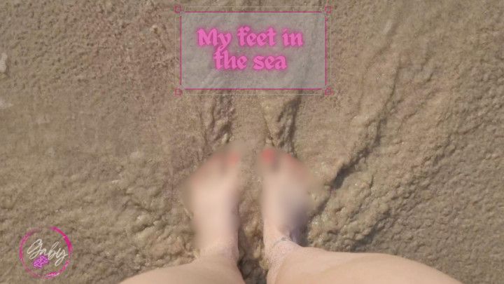 Playing with my feet in the sand