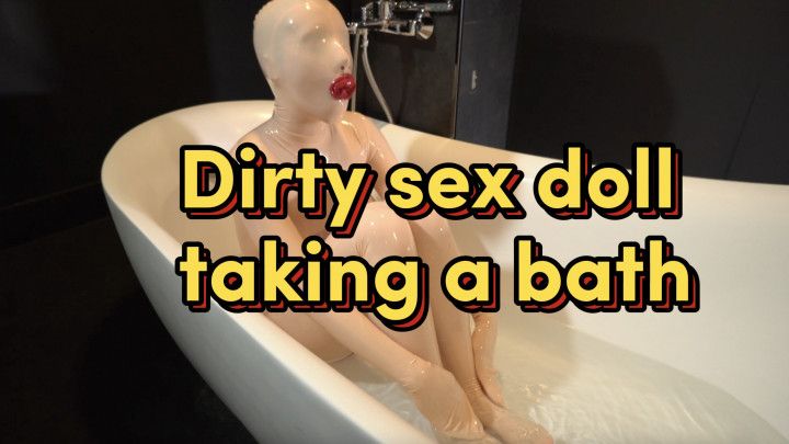 Dirty sex doll taking a bath