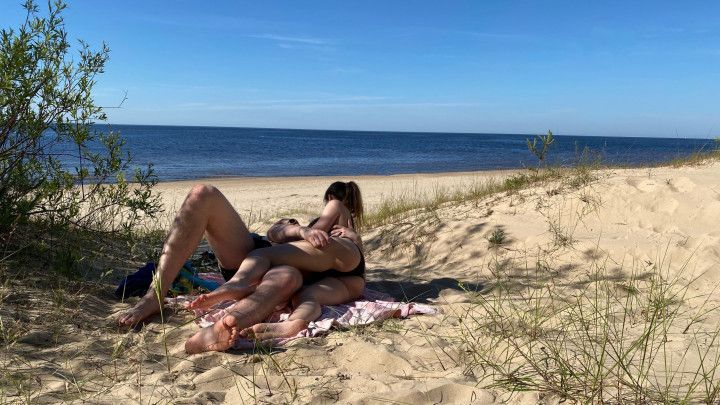 Couple enjoying blowjob at the beach