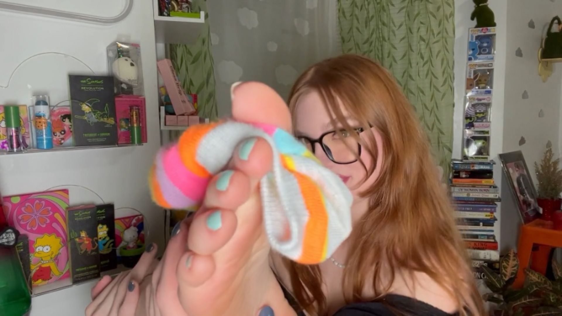 Sniffing my stinky rainbow socks