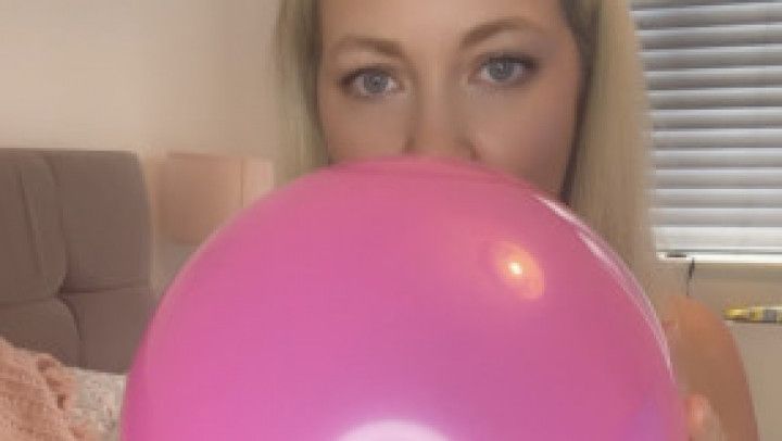 Huge balloon blowing bouncing and popping 3 times