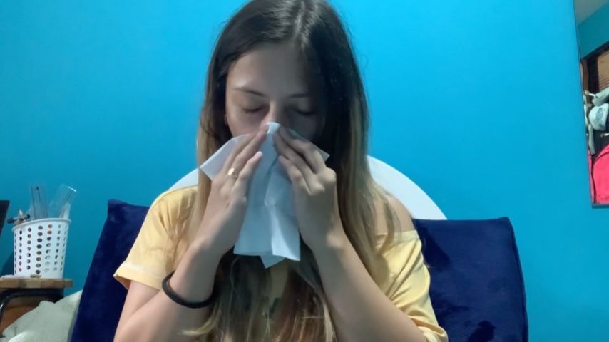 Babe with a cold blows her nose