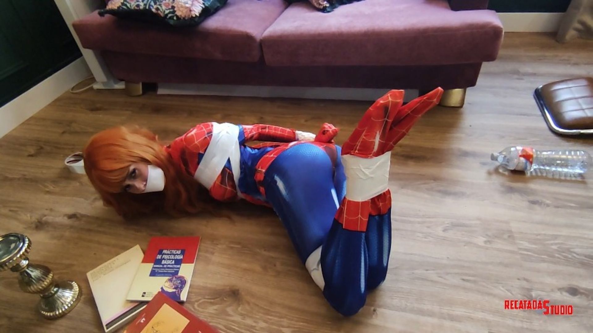 Spiderwoman bound and gagged in trouble