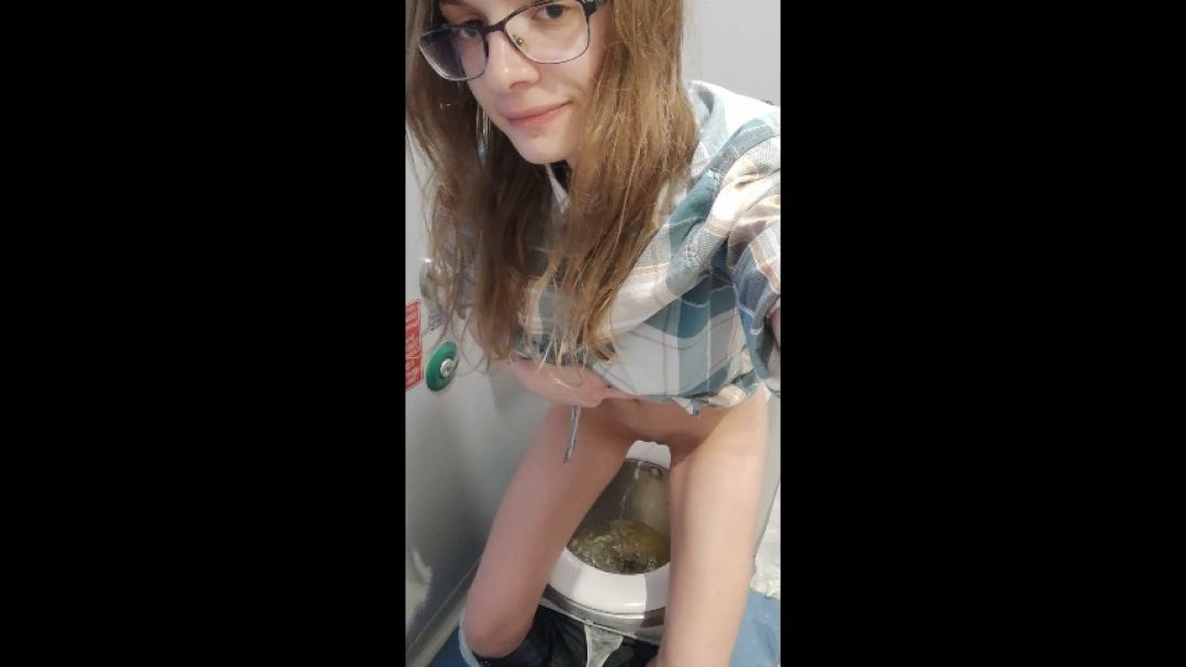 Pissing in a train toilet