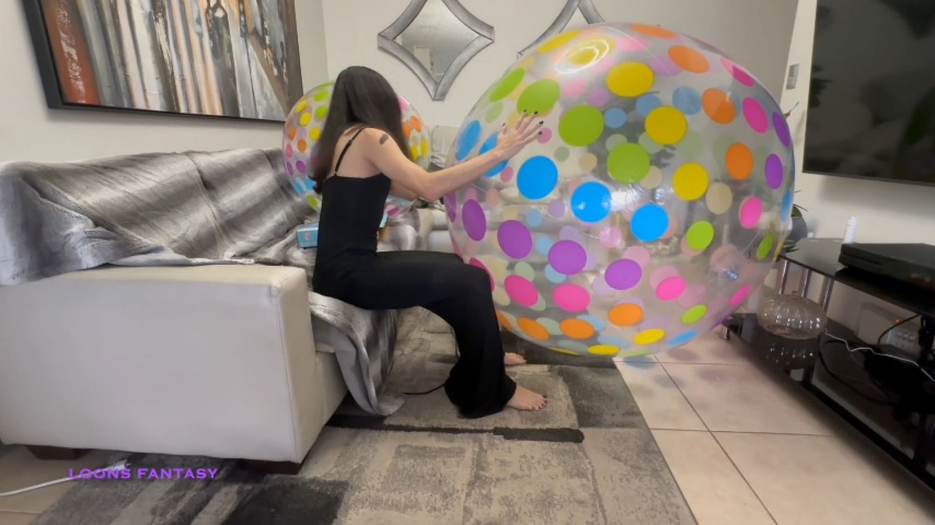 Owllete inflates and cleans colossal beach ball