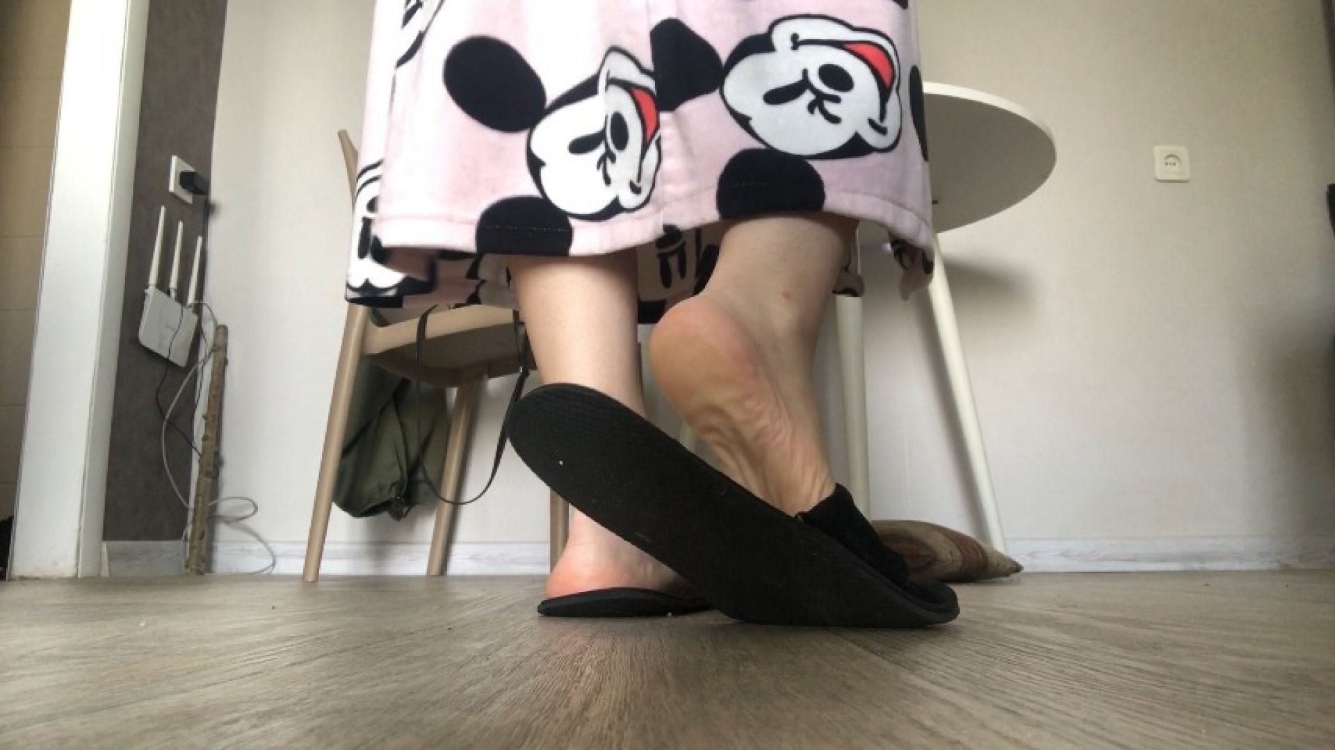 Slippers, soles tease