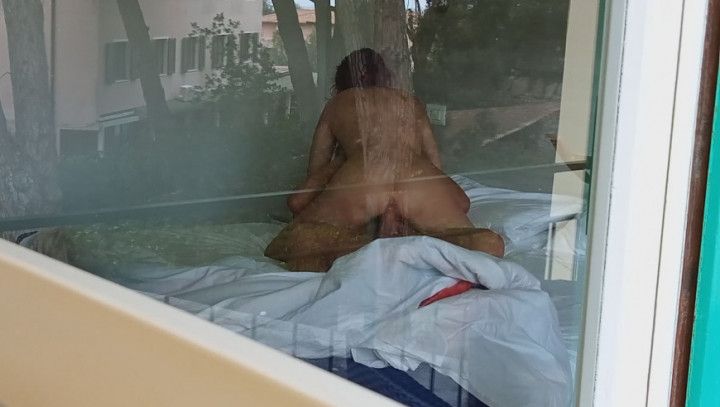 Caught couple fucking front hotel window