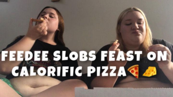 FEEDEE SLOBS FEAST ON CALORIFIC PIZZA