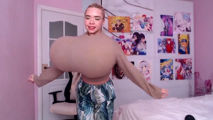 Mia is fooling with giant boobs