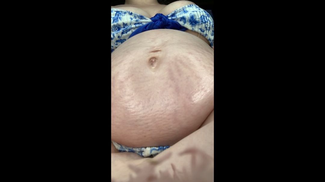 MastersLBS 14 weeks pregnant belly oil under view