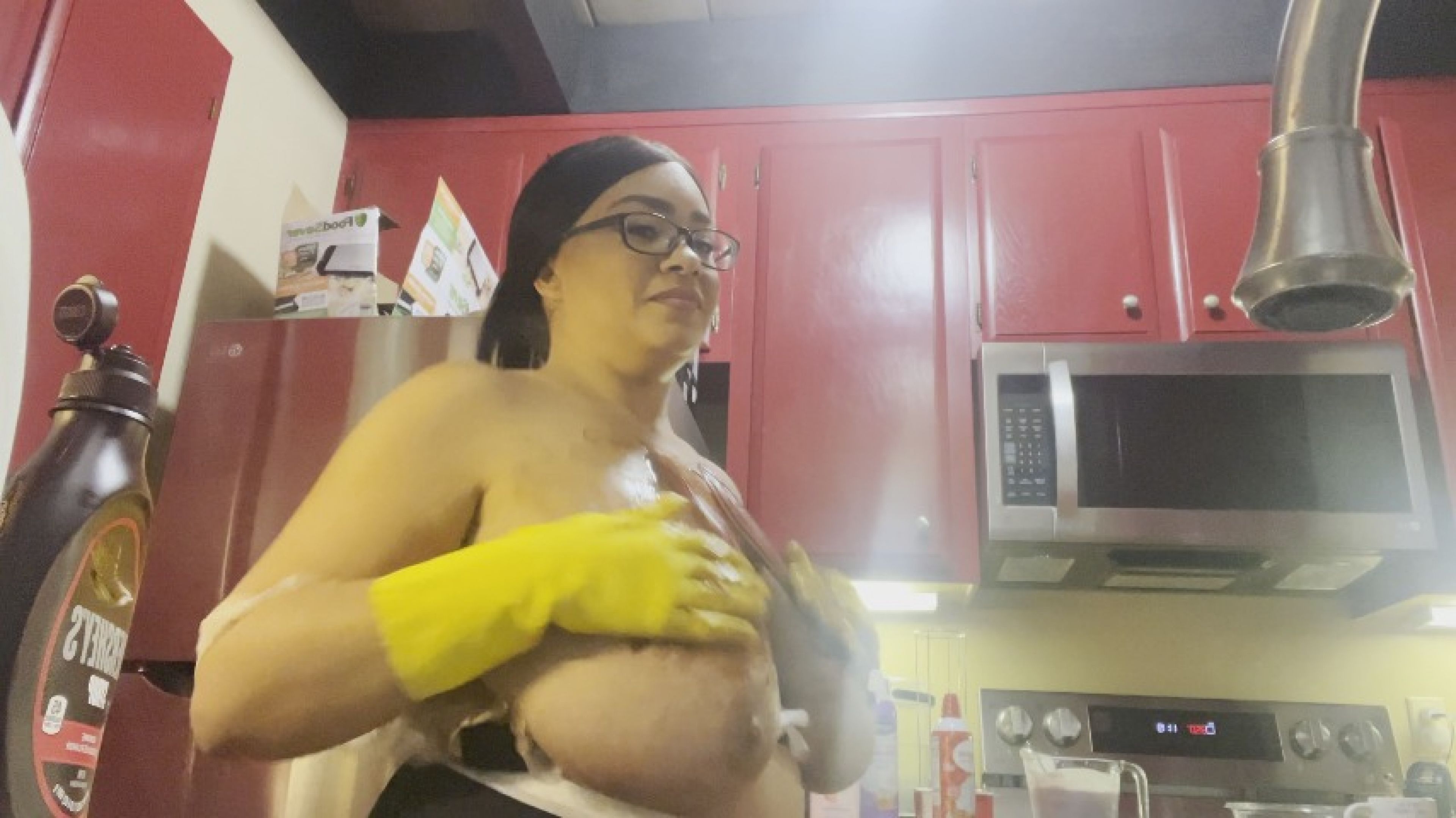 Maid with gloves gets caught pouring chocolate on her tits