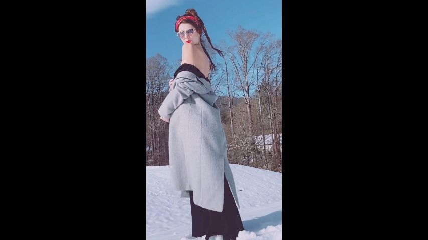 Undressing in a Snow Covered Field