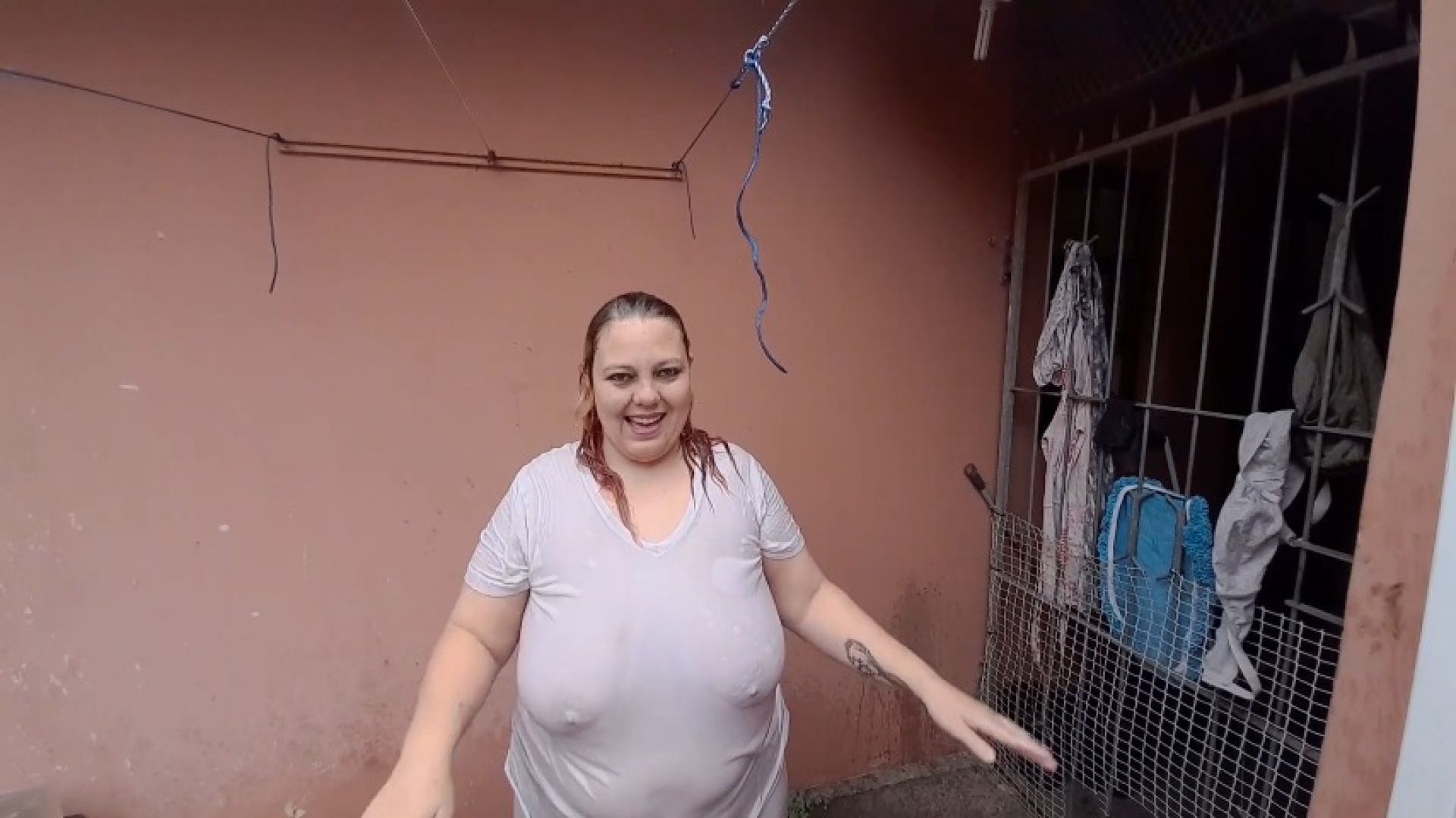 Wetlook in white clothes in the rain