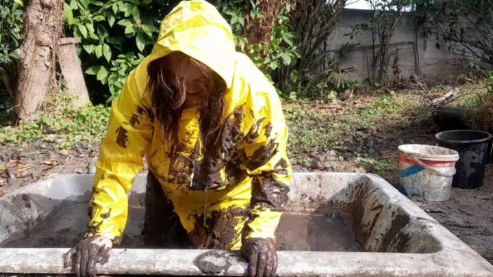 Soaking in mud in my rainwear