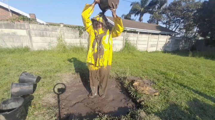 Yellow PVC rainwear and a muddy affair