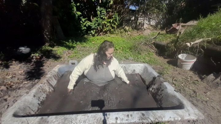 Tempting mud in denim overalls and sweater