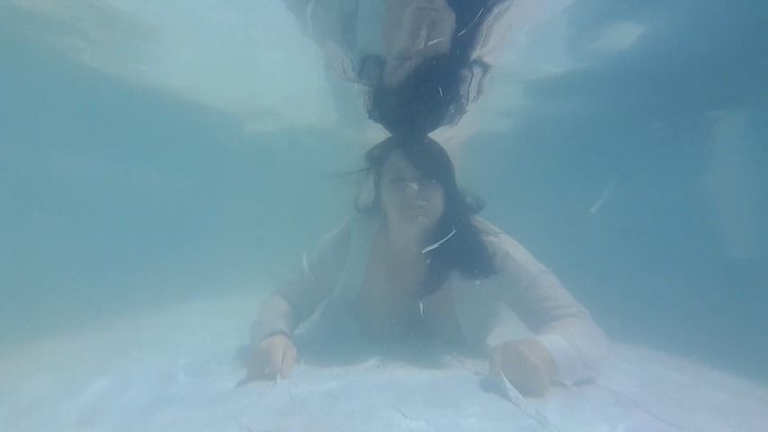 Submerged Underwater in White Blouse